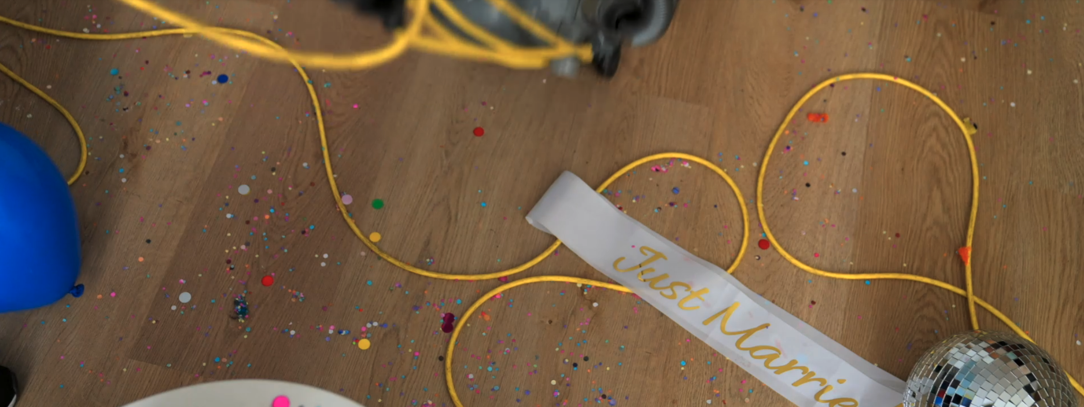 Vacuuming a hardwood floor after a celebration